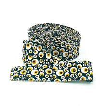 Load image into Gallery viewer, Quilt Binding Beggar's Night Eyeballs Glow-In-The-Dark Black 1 1/4" Single Fold Binding Sandy Gervais