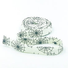 Load image into Gallery viewer, Double Fold Bias Tape 1/2'' Beggar's Night Spiderwebs Cream Black Halloween Bias Binding