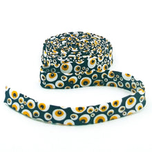 Load image into Gallery viewer, Double Fold Bias Tape 1/2'' Beggar's Night Eyeballs Black Glow in the Dark Halloween Bias Binding