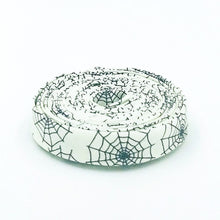 Load image into Gallery viewer, Double Fold Bias Tape 1/2'' Beggar's Night Spiderwebs Cream Black Halloween Bias Binding