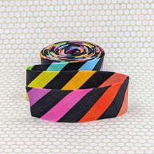 Load image into Gallery viewer, Tula Pink Bias Quilt Binding Disco Stripe Rainbow Carbon 1 1/4" Single Fold