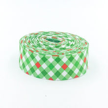 Load image into Gallery viewer, Quilt Binding Jingle Bells Plaid Gingham Green Red 1 1/4&quot; Wide Single Fold
