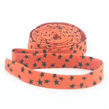 Load image into Gallery viewer, Double Fold Bias Tape 1/2'' Beggar's Night Stars Orange Black Halloween Bias Binding
