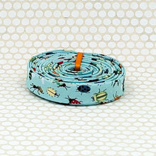 Load image into Gallery viewer, Double Fold 1/2'' Bias Tape Insects and Bugs Aqua Blue Binding
