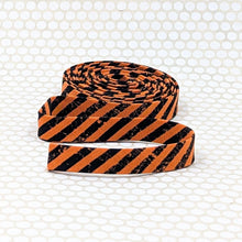 Load image into Gallery viewer, Double Fold Bias Tape 1/2'' Costume Maker's Act II Ruler Stripe Orange Black Binding
