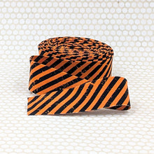 Load image into Gallery viewer, Quilt Binding Scary Scraps Stripe Orange Black 1 1/4" Single Fold

