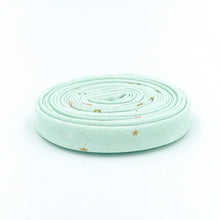 Load image into Gallery viewer, Double Fold Bias Tape 1/2&#39;&#39; Spin &amp; Twirl Stars Mist Mint Green Sparkle Gold
