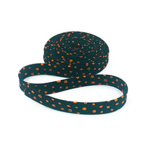 Load image into Gallery viewer, Double Fold Bias Tape 1/2&#39;&#39; Bad To The Bone Dots Black Orange
